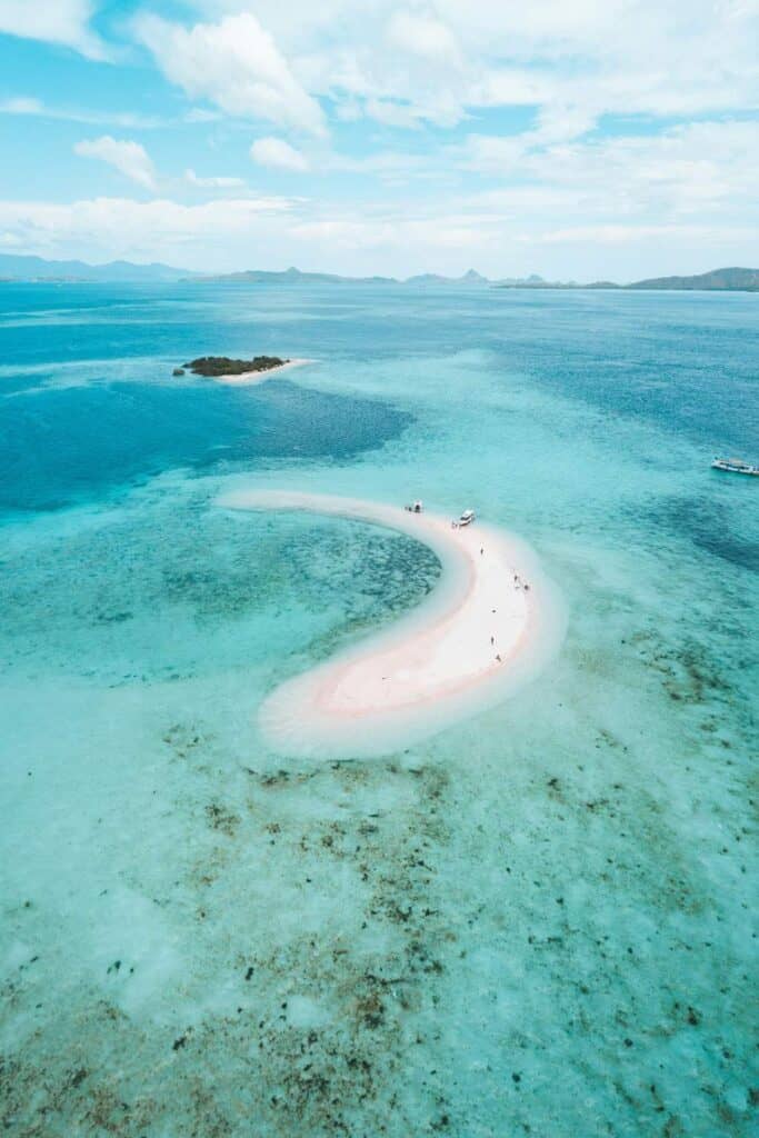 overview of Nusa Tenggara white sandbank in a turquoise lagoon